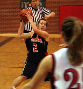 Kristi Poxleitner looks to pass in the Council game.
