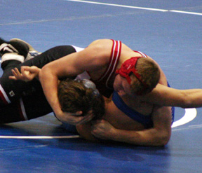 Ronald George was in control of his opponent. He went on to win by pin.