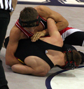 Tyrell Langston has an arm hooked and is turning his opponent over.