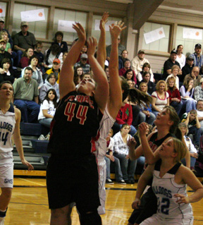 Hilaree VanderPas got inside the Grangeville defense for a lay-up. At right is Kim Schaeffer.