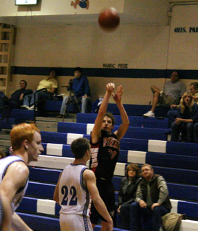 David Sigler puts up a 3-point shot against Orofino.