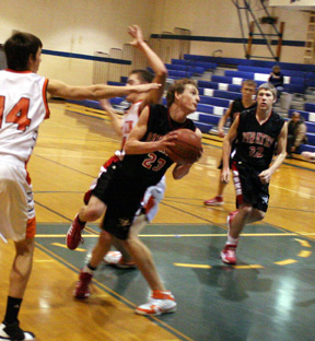David Sigler makes a move to get past a defender for a lay-up.