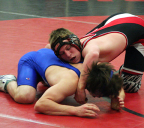 Brandon Poxleitner goes for a hold on Orofino's Michael Skinner.
