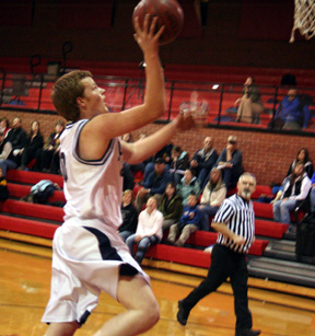 Dustin Lustig goes for a lay-up
