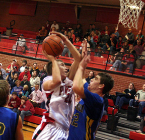 Devon Schmidt puts a shot up from the lane.