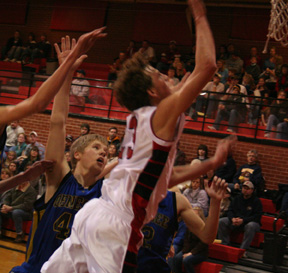 David Sigler goes to the hoop.