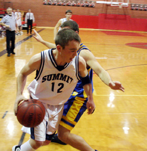 Zach Frei drives the baseline.