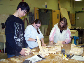 Ryan Dalgliesh, Shawna Kaschmitter and Kendra Dining building a crane.