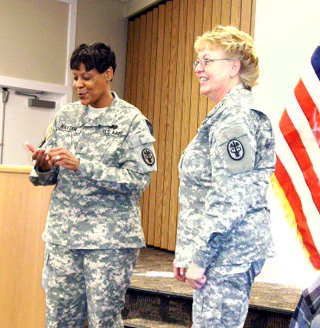 Colonel Joann Hollandsworth, right, at her retirement celebration.