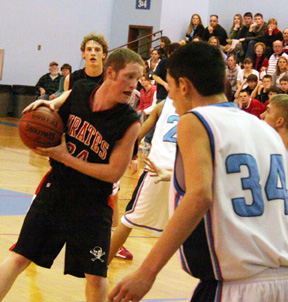 Tyler Forsmann handles the ball in the lane at Lapwai.