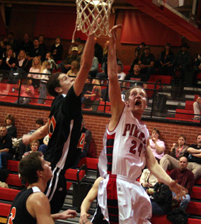 Tyler Forsmann scores a lay-up against Kendrick.