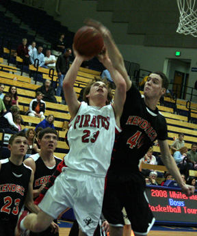 David Sigler tries to get a shot past the outstretched arm of Kendrick's Chase Christopher.