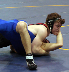 James Jackson scores the pin in his opening round match. He wound up losing in overtime in the match that would've clinched a state medal.
