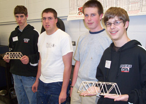 Eric Daly, Chance Ratcliff, Garrett Workman and Randy Becker with their completed bridges.