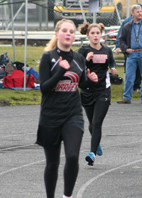 Betty Clark leads in the 3200 and went on to win the event.