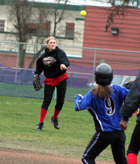 Leora Laurino throws the ball to the infield in the Orofino game.