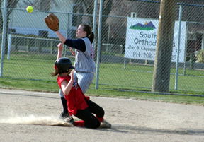 Alena Hoene slides safely into second base. . .after striking out! She made it all the way to second on the passed ball.