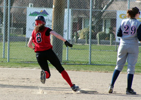 Tiffany Schaeffer heads for third with a triple to lead off the game.