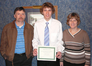 Carson Heath with his parents Gordon and Theresa after being awarded the scholarship.