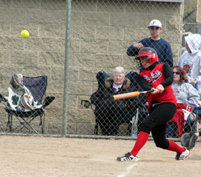 Brooke Holthaus connects against Troy.