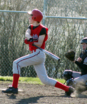 Seth Guyer swings at a pitch in the Timberline game.