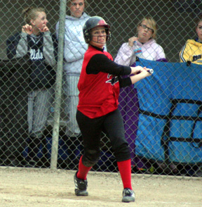 Alli Holthaus hits a double against Genesee.