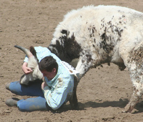 Chance Ratcliff competes in steer wrestling.