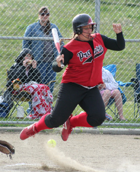 Hilaree VanderPas jumps out of the way of a low inside pitch in the championship game. She responded with 3 straight run-scoring doubles.