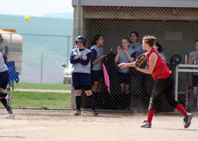 Kara Guyer throws out a Lewis County runner at first.