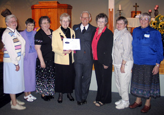 The Benedictine Sisters of the Monastery of St. Gertrude receive the award.