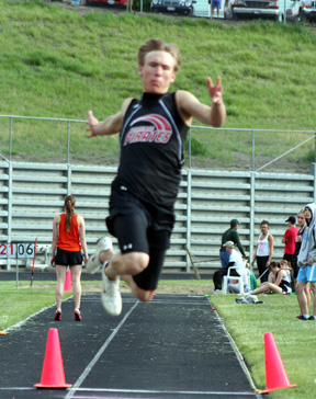 Devin Schmidt soared to a personal best of 40' 3/4 to win the triple jump at the Area Best Meet.