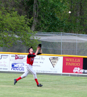 Seth Guyer is about to make a catch in centefield against Troy.