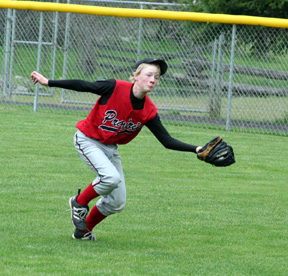 Silas Whitley makes a running catch in right field against Lewis County.