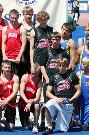 The boys 4x100 team after receiving their medals. From top down are Devin Schmidt, David Sigler, Jon Rice and Kyle Daly.