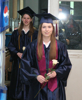 Valedictorian Lauren Chmelik leads the graduates during the Procession. Right behind her is Salutatorian Anna Osborne.