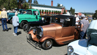 A closeup view of some of the cars in the Show and Shine.