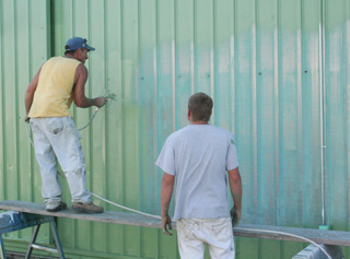 The Arena Building gets a new coat of paint.