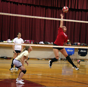 Chelsea Long spikes the ball during volleyball practice Monday.