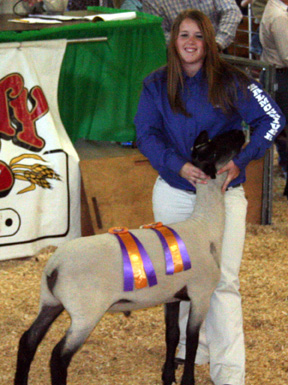 Round Robin and Sheep Grand Champion Showman Jessica Munson.