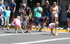 Children swarmed after the candy thrown out from many of the parade entries.