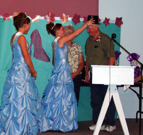 The grand marshals were crowned as Mr. and Mrs. Monopoly during the Royalty Night entertainment.