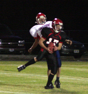 Kyle Holthaus, who normally throws the passes, caught this one from David Sigler for a 43 yard gain.