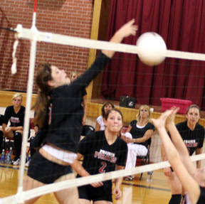 Sam Frei tips the ball over for a winner.