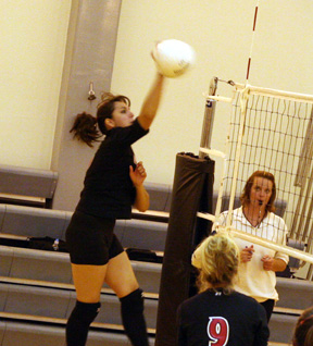 Sam Johnson spikes the ball at the Kendrick Tournament.