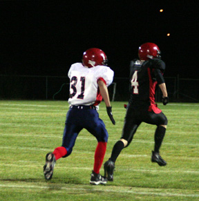 Devin Schmidt runs away from a defender for a 39 yard TD. He also returned a kickoff for a touchdown.