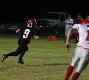 Brock Heath scores a touchdown on a reverse.