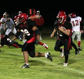 Kyler Shumway lead blocks for Kyle Daly.