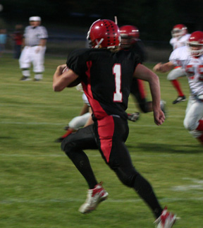 David Sigler heads for the end zone on a punt return. C.V. kicked away from him the rest of the game.