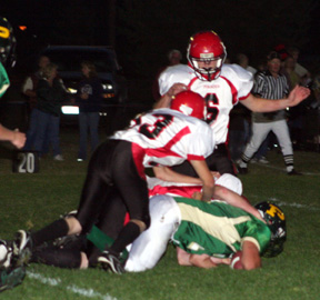 Cody Miller, 33, and Branden Waller, 6, come in to help with a tackle that we think is made by Kyle Daly.