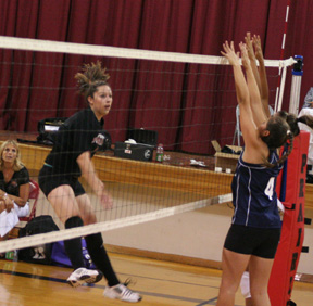 Kaylee Uhlenkott pounds a spike against Lapwai.